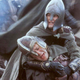 Pippin (Billy Boyd) cradles a gravely wounded Merry (Dominic Monaghan) in the aftermath of the Battle of Pelennor Fields.